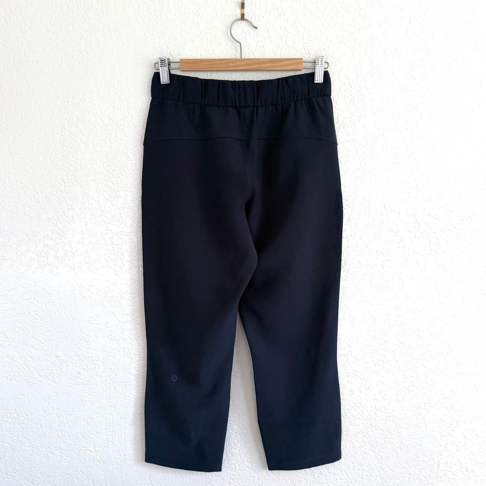Lululemon On the Fly Crop True Navy Luxtreme Drawstring Pants Commuter Size 4 - Picture 7 of 14